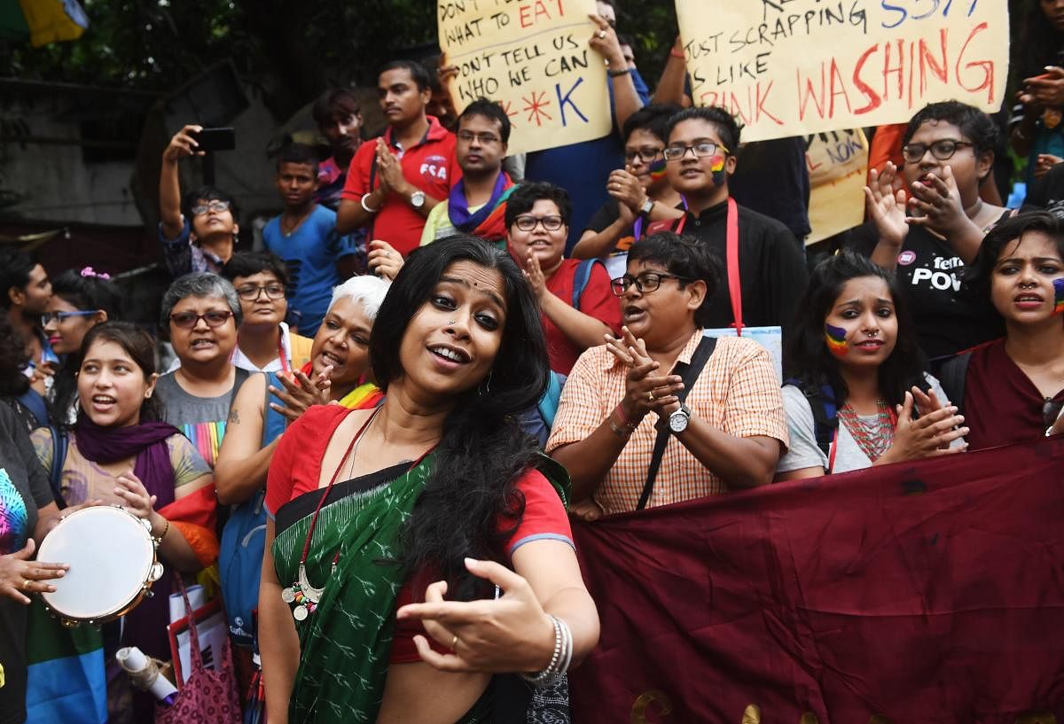 Indian members and supporters of the lesbian, gay, bisexual, transgender (LGBT) community celebrate the Supreme Court decision to strike down a colonial-era ban on gay sex, in Kolkata. AFP file photo
