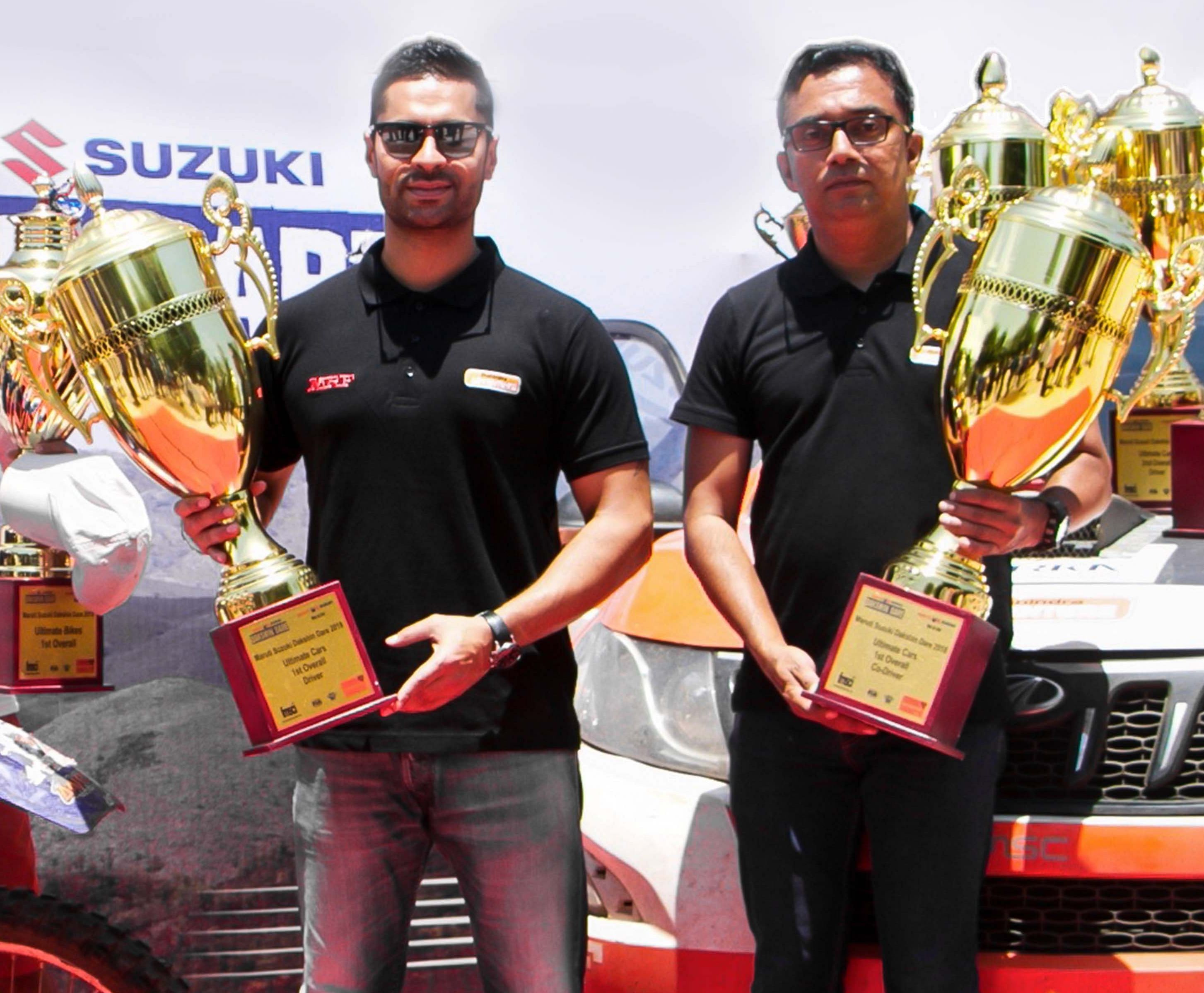 CHAMPIONS Team Mahindra Adventure racer Gaurav Gill (left) and his navigator Musa Sherif with their trophies after clinching the Dakshin Dare Rally in Goa on Saturday.