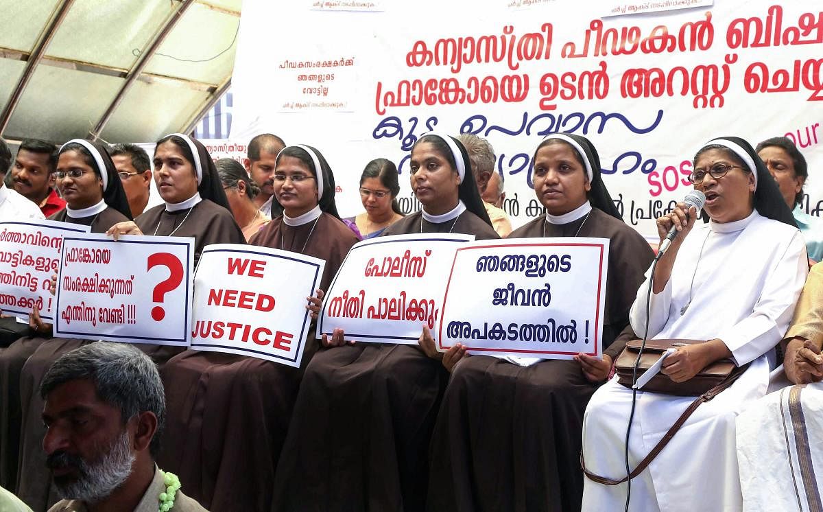 Nuns protest against the delay in action against the Roman Catholic Church Bishop, who is accused of sexually exploiting a nun, in Kochi on Saturday. PTI