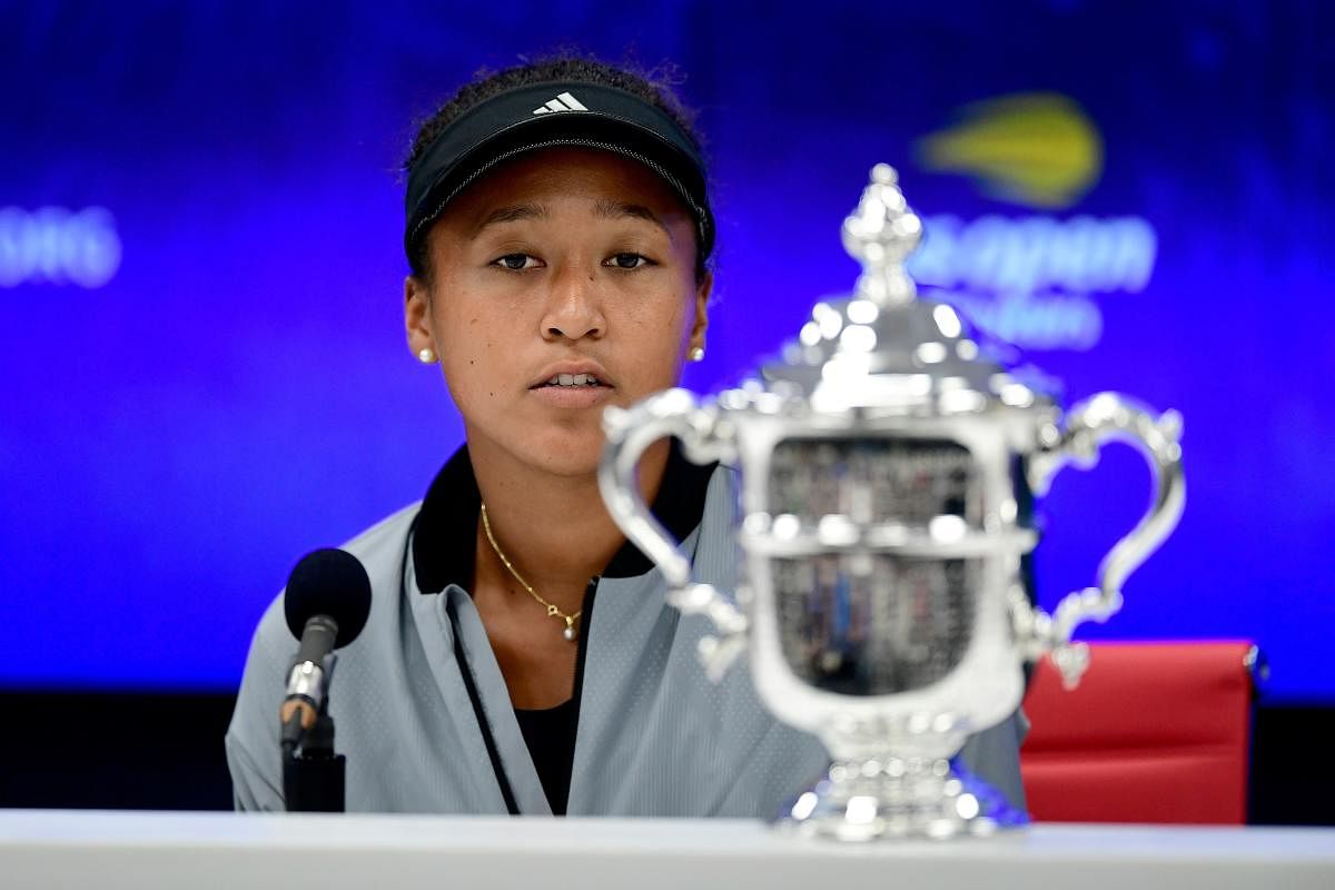 Naomi Osaka of Japan speaks to the media after winning the Women's Singles finals match against Serena Williams of the United States on Day Thirteen of the 2018 US Open at the USTA Billie Jean King National Tennis Center on September 8, 2018 in the Flushing neighborhood of the Queens borough of New York City. Sarah Stier/AFP