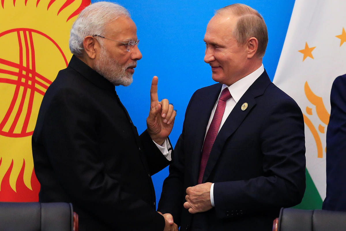 Prime Minister Narendra Modi and Russian President Vladimir Putin at the signing ceremony during the Shanghai Cooperation Organisation (SCO) summit in Qingdao, China. (Reuters File Pic)
