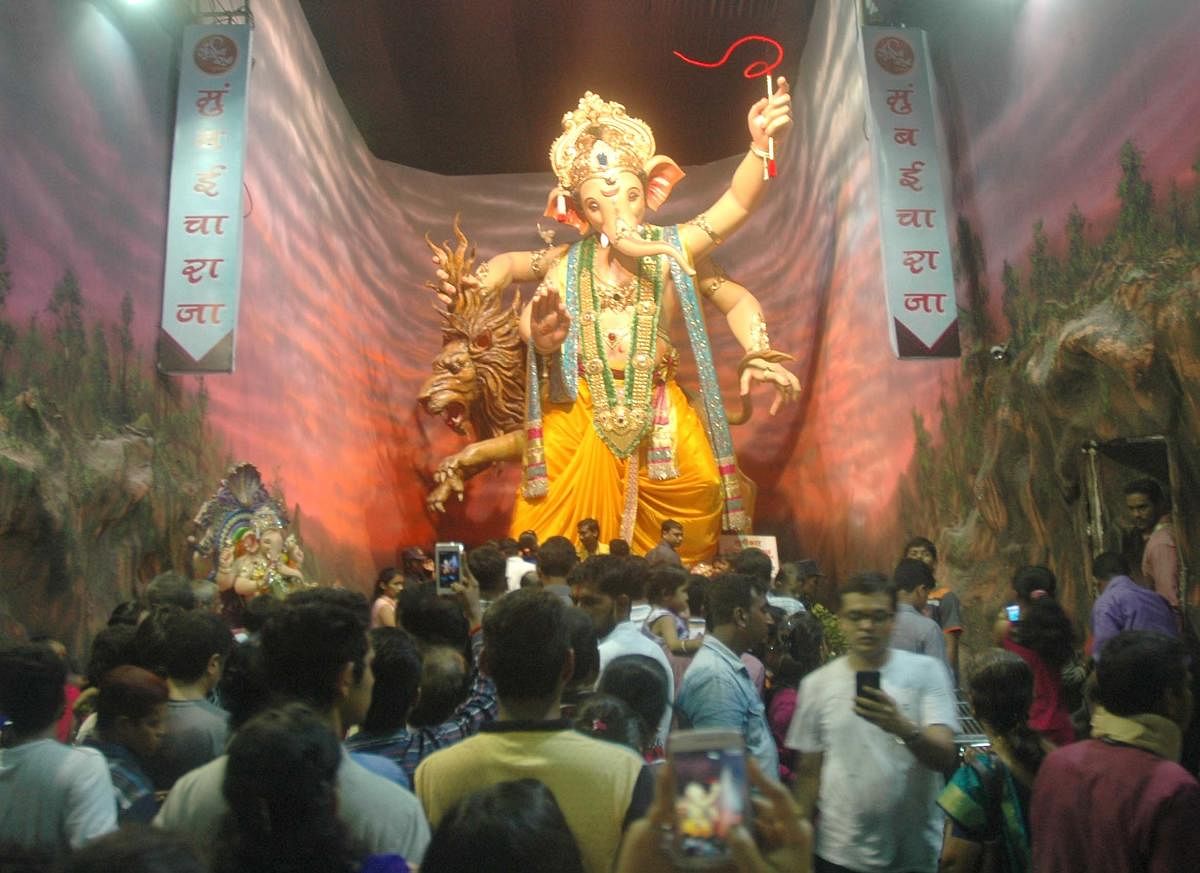 Devotees pay obeisance to Lord Ganesha at Ganesh Galli, in Parel, Mumbai. (DH File Pic)