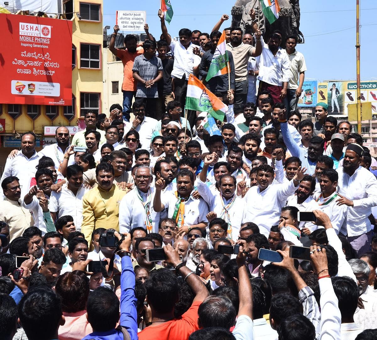 Congress party workers stage a protest at Chennamma Circle in Hubballi, during 'Bharat Bandh' on Monday.