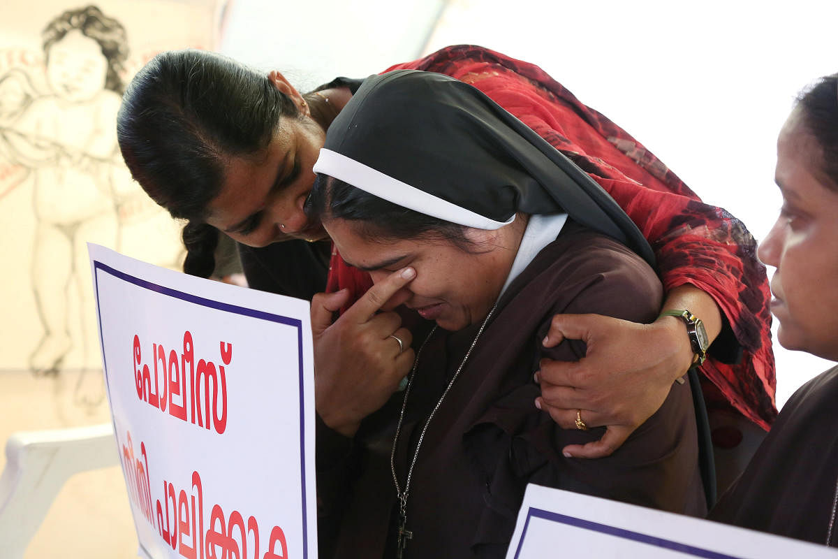 A woman consoles a nun during a protest demanding justice to an nun allegedly raped by a bishop, in Kochi on September 13, 2018. (Reuters File Pic)