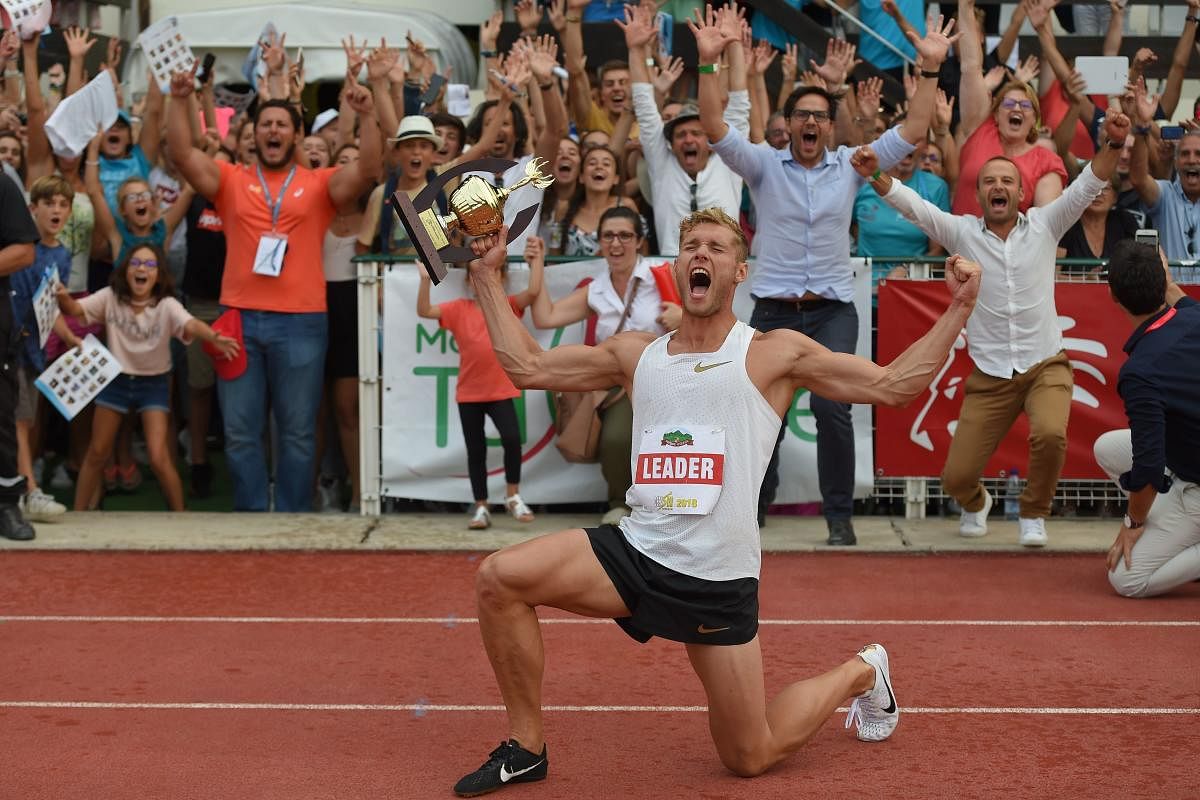 France's Kevin Mayer celebrates with his trophy after setting a new world record in the decathlon during the IAAF 'Decastar' World Combined Events Challenge in Talence, France on Sunday. AFP