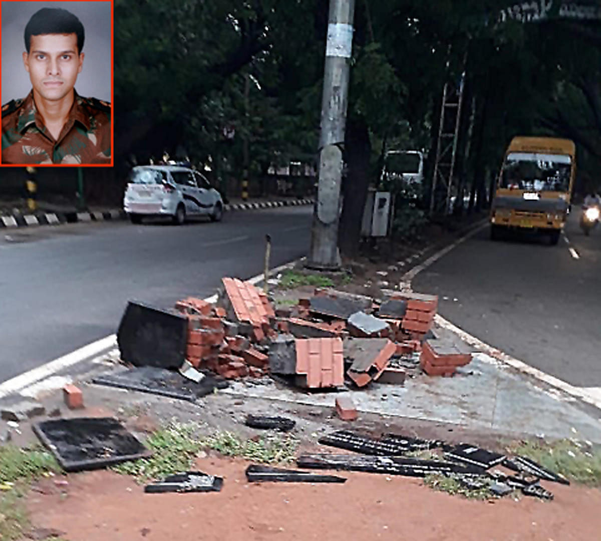 A plaque of Major Sandeep Unnikrishnan (inset) that was damaged by a truck in Yelahanka. 