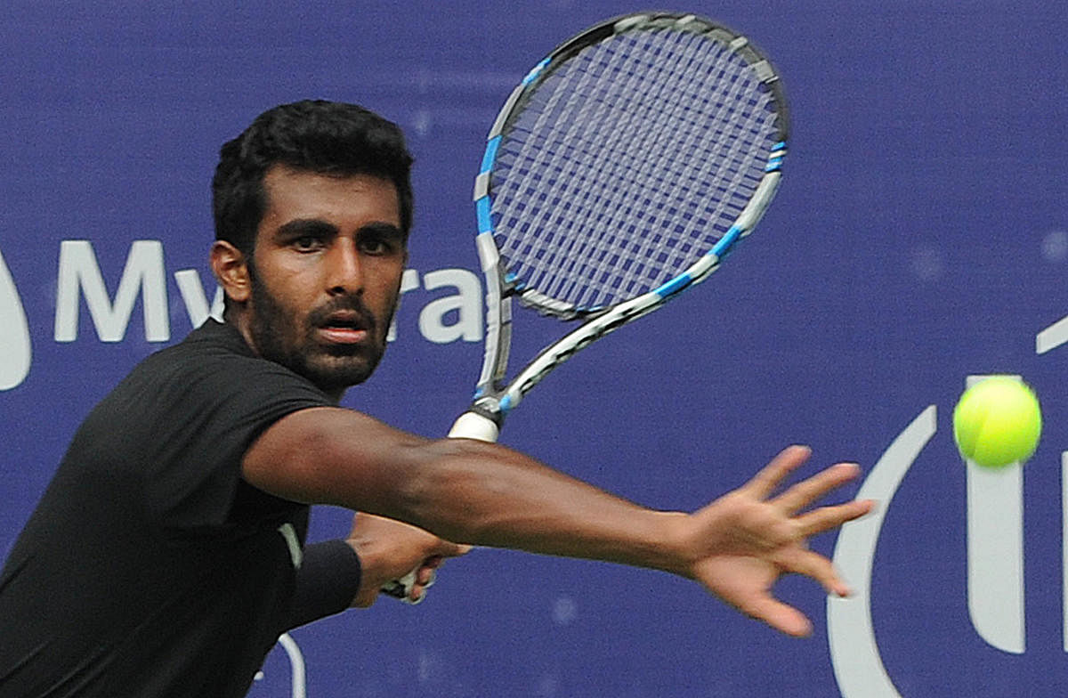 Prajnesh Gunneswaran won his maiden singles ATP Challenger title after beating Egypt's Mohammed Safwat in Anningon Sunday. DH File Photo