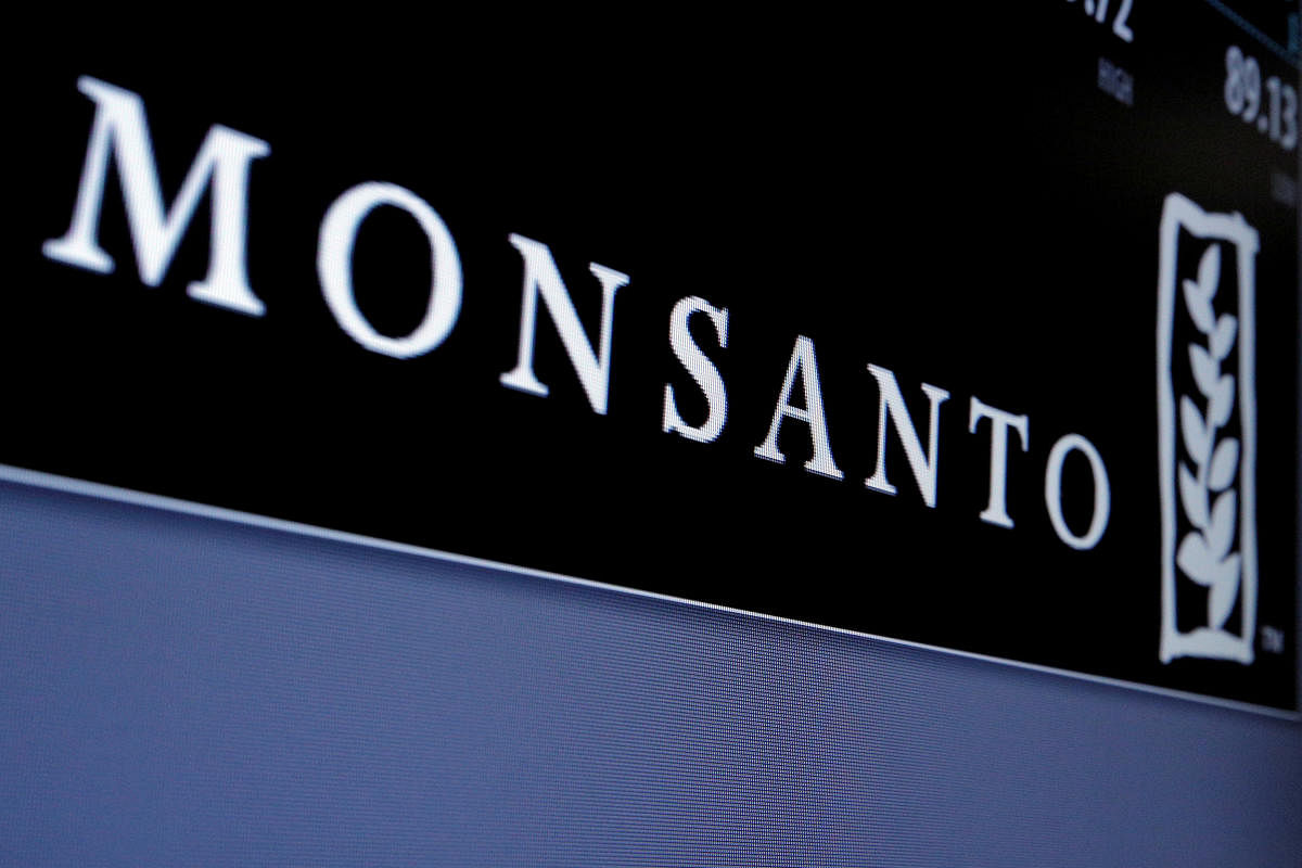 FILE PHOTO: Monsanto is displayed on a screen where the stock is traded on the floor of the New York Stock Exchange (NYSE) in New York City, U.S., May 9, 2016. REUTERS/Brendan McDermid/File Photo