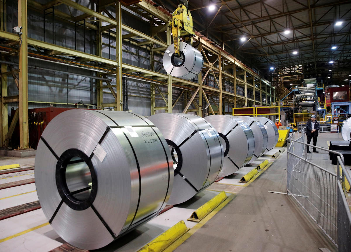 FILE PHOTO: Rolled up steel sits in the ArcelorMittal Dofasco steel plant in Hamilton, Ontario, Canada, March 13, 2018. Reuters