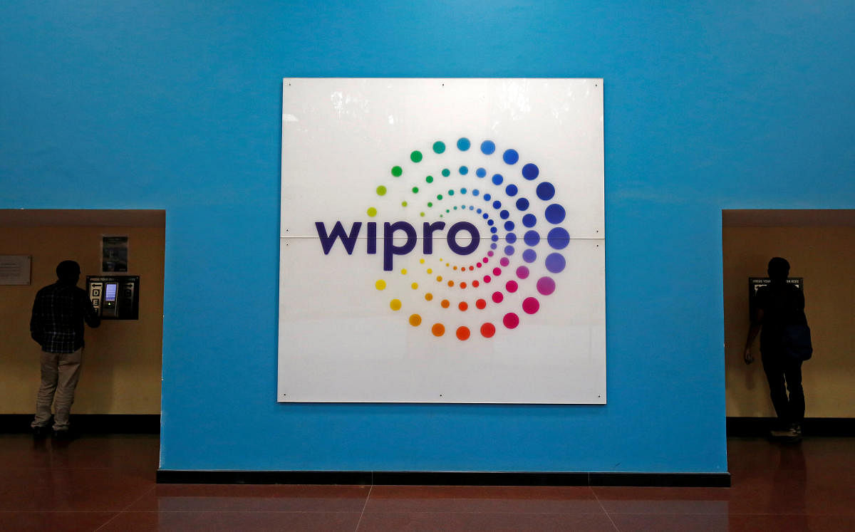 The logo of Wipro is seen inside the company's headquarters in Bengaluru. REUTERS