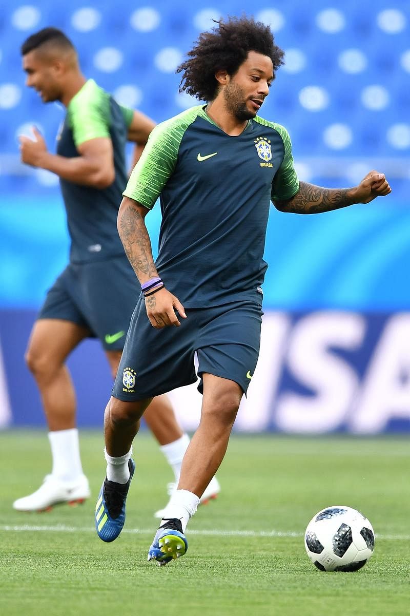 Brazil defender Marcelo always runs onto the pitch right foot first. AFP