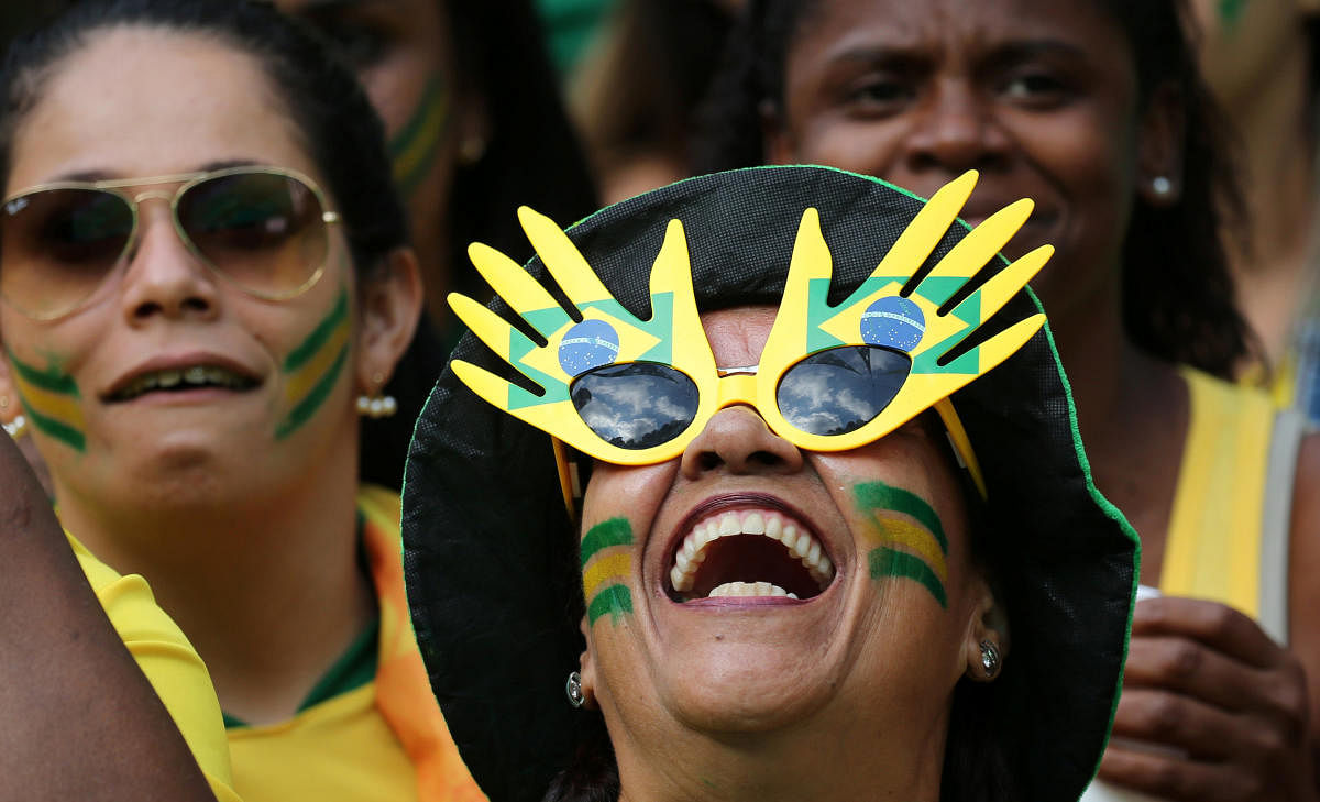 A Brazilian fan reacts during the game against Serbia, in Rio de Janeiro. (Reuters)