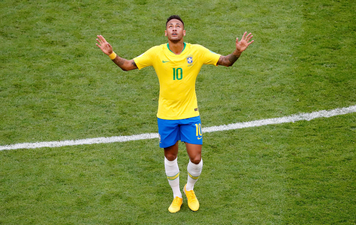 Neymar celebrates scoring their first goal. REUTERS