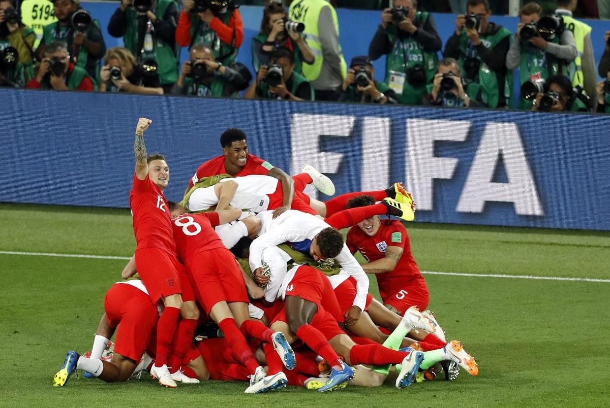England players celebrate after defeating Colombia in a penalty shootout at the end of the round of 16 match between Colombia and England at the 2018 soccer World Cup in the Spartak Stadium, in Moscow, Russia, Tuesday, July 3, 2018. AP Photo