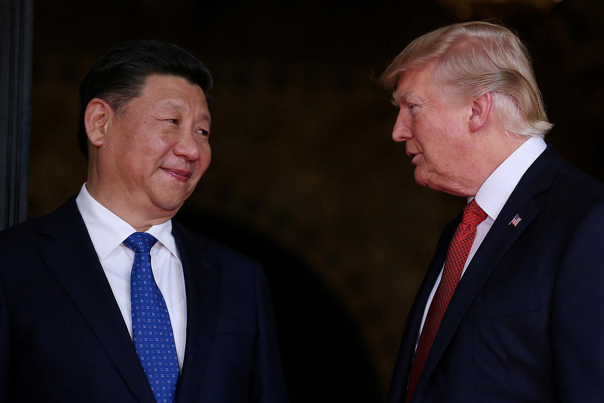 US President Donald Trump welcomes Chinese President Xi Jinping at Mar-a-Lago state in Palm Beach, Florida, U.S., April 6, 2017. Reuters file photo