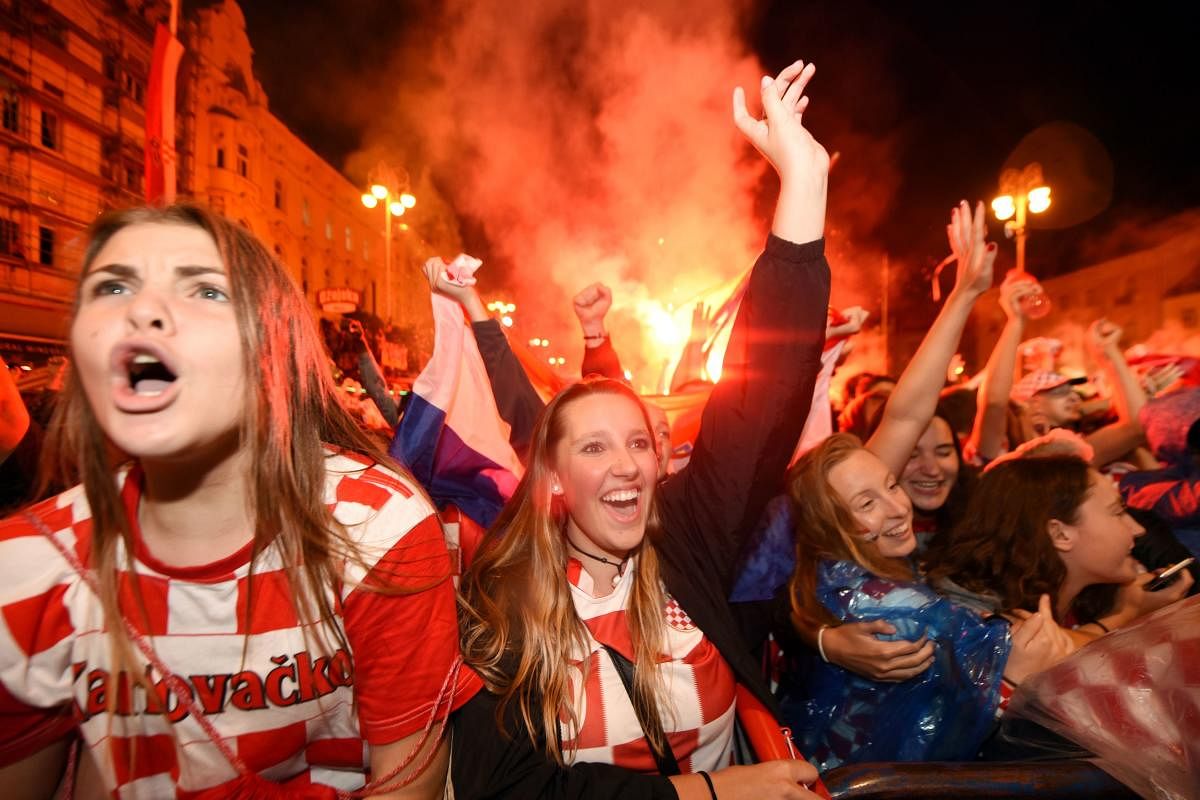 SOAKING IN THE SUCCESS Revellers thronged the streets of Zagreb after Croatia marched into their maiden World Cup final on Wednesday. AFP