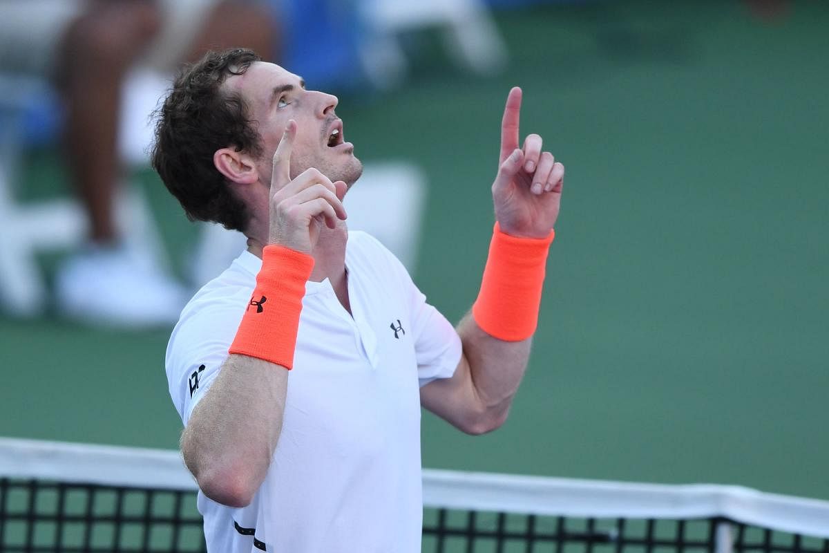 Andy Murray celebrates his win over Kyle Edmund in Washington on Wednesday. AFP