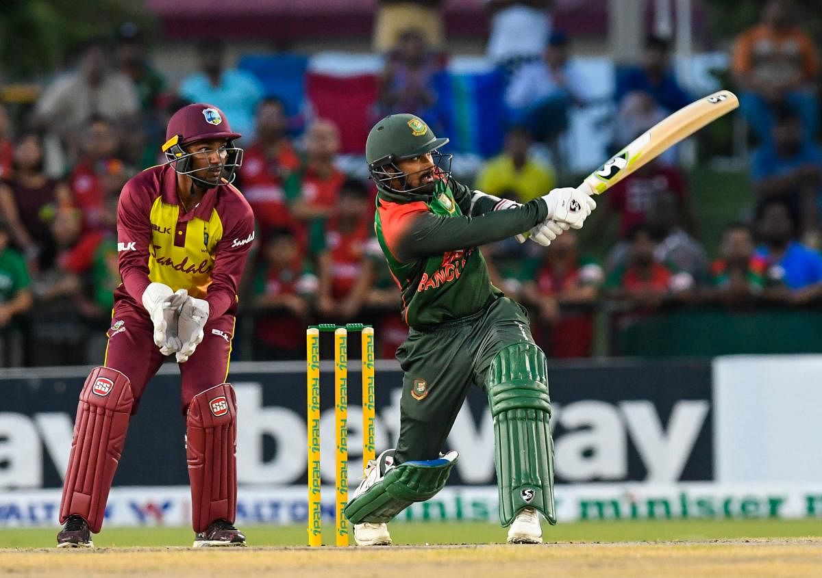 Bangladesh batsman Liton Das sends one over the fence in the third T20I against West Indies in Lauderdale, Florida, on Sunday. AFP
