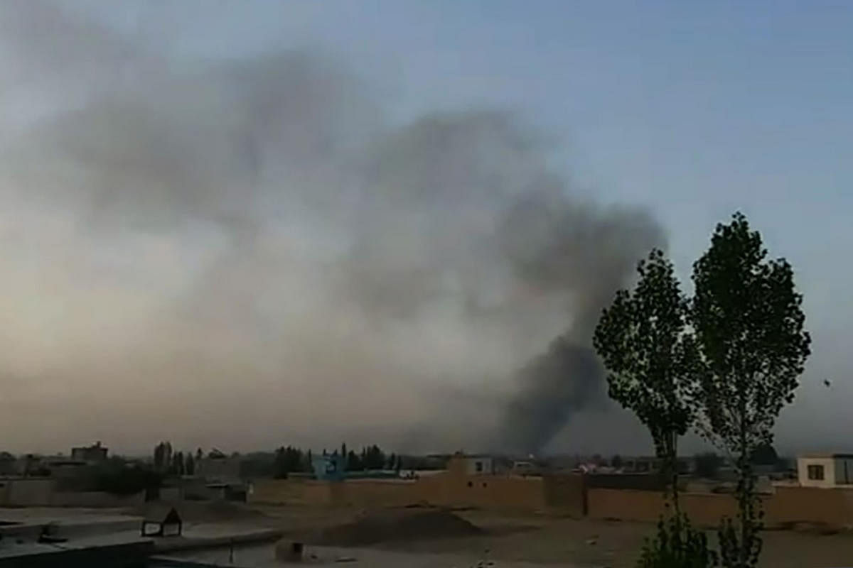 This screen grab taken from AFPTV video on August 10, 2018 shows smoke rising into the air after Taliban militants launched an attack on the Afghan provincial capital Ghazni, with terrified residents cowering in their homes amid explosions and gunfire. -