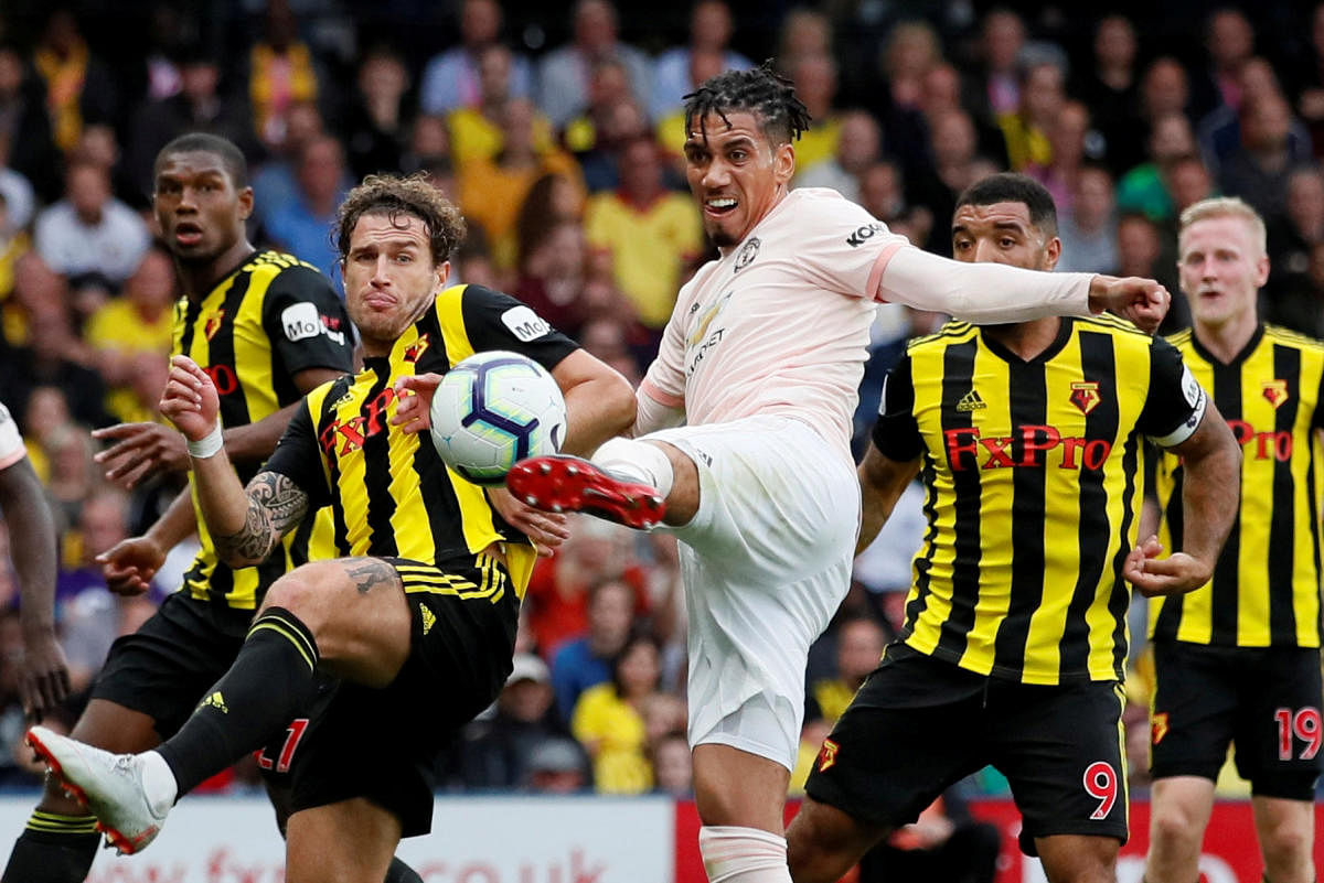 Manchester United's Chris Smalling scores their second goal against Watford on Saturday. Reuters