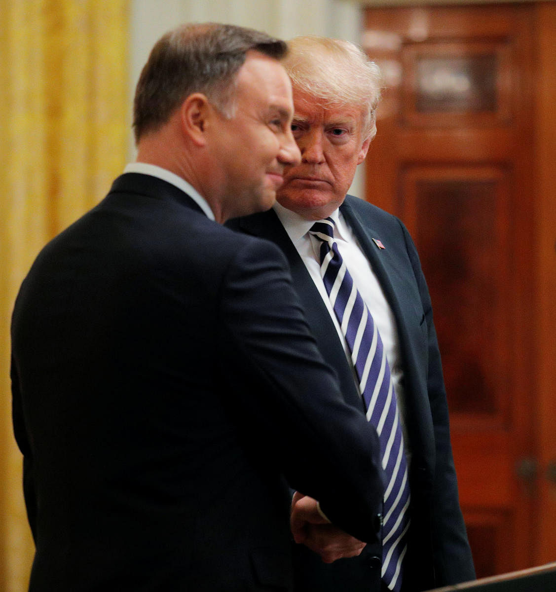 US President Donald Trump with Poland's President Andrzej Duda at the end of a joint news conference in the East Room of the White House in Washington on September 18, 2018. Reuters