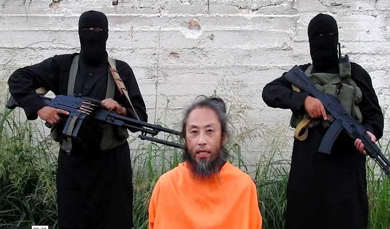A jihadist group has released videos of a Japanese journalist and an Italian man held captive in Syria in which they appeal for their release, US-based monitors said on Wednesday. picture courtesy Twitter