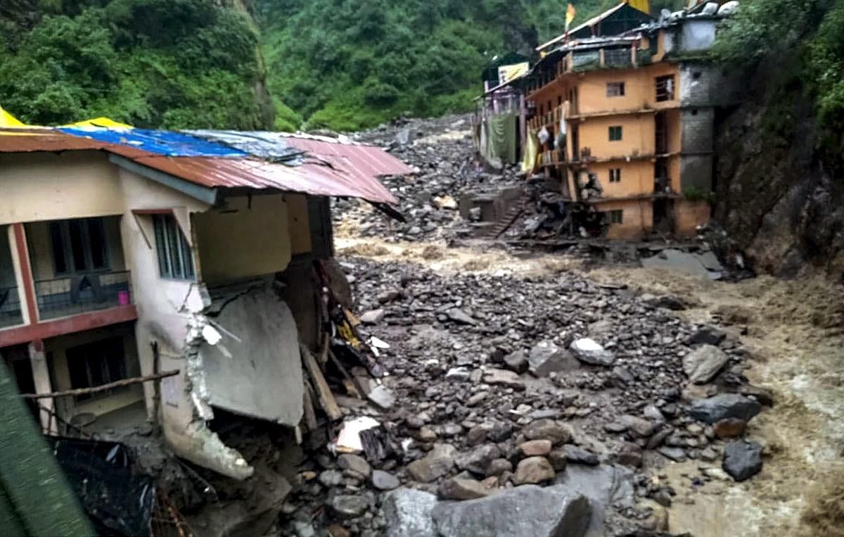 A view of a damaged house after heavy rains following a cloudburst, in Uttarkashi on Wednesday, July 18, 2018. (PTI Photo)