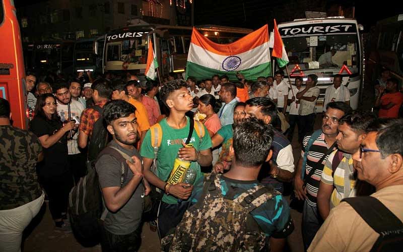 Amid tight security, the first batch of nearly 3,000 Amarnath pilgrims from Jammu reached the twin base camps at Baltal and Pahalgam in Kashmir on Wednesday evening. (PTI Photo)
