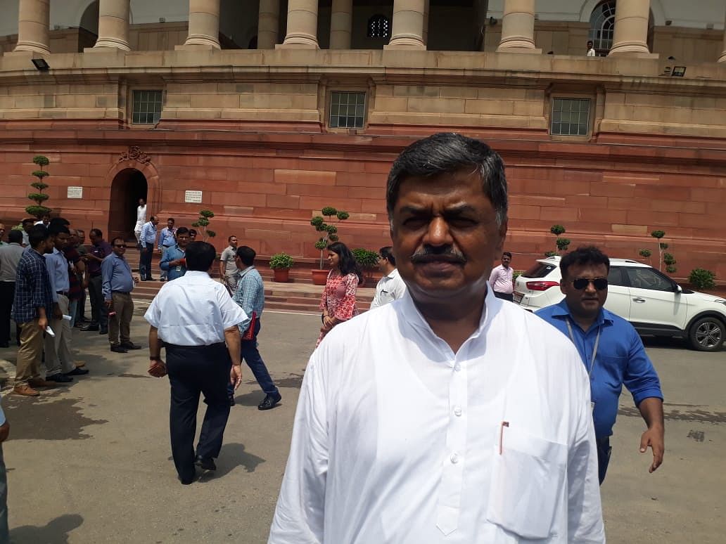B K Hariprasad in front of Parliament after Opposition declared his candidature for Rajya Sabha deputy chairman post on Wednesday. (DH Photo)