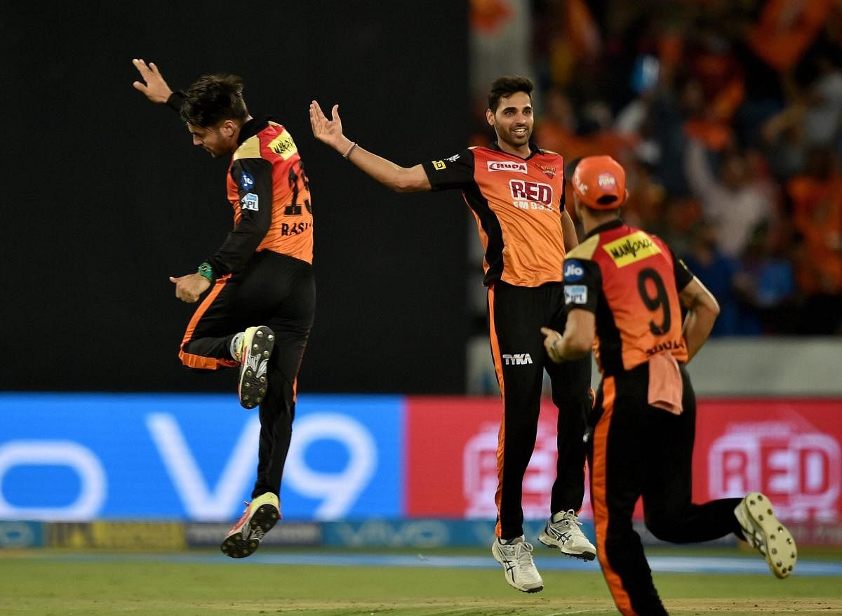 Sunrisers Hyderabad's Rashid Khan (left) and Bhuvneshwar Kumar (centre) have been the pick of their bowlers. PTI