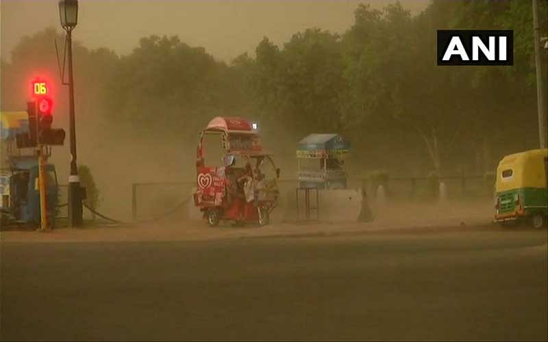 In a sudden change of weather, the sky turned cloudy around 4:30 pm and gusty winds swept the city. Image: ANI Twitter