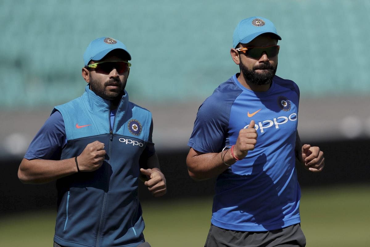 Ajinkya Rahane (left) is expected to be given the reins of captaincy, with Virat Kohli deciding to skip the Test against Afghanistan. AP/ PTI