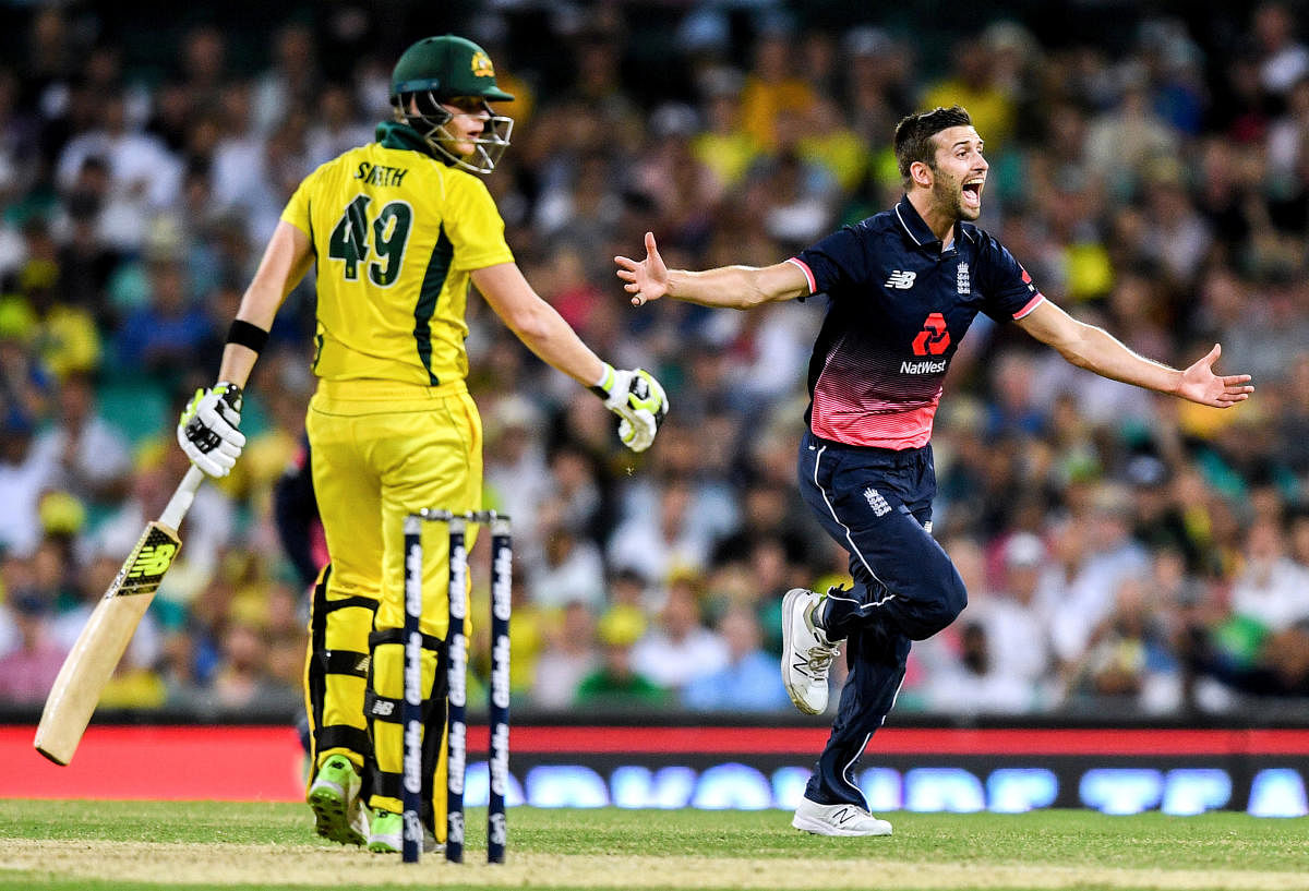 Having sat out nine of CSK's matches, Mark Wood (right) has decided to go back to England and play for Durham to boost his Test prospects. Reuters