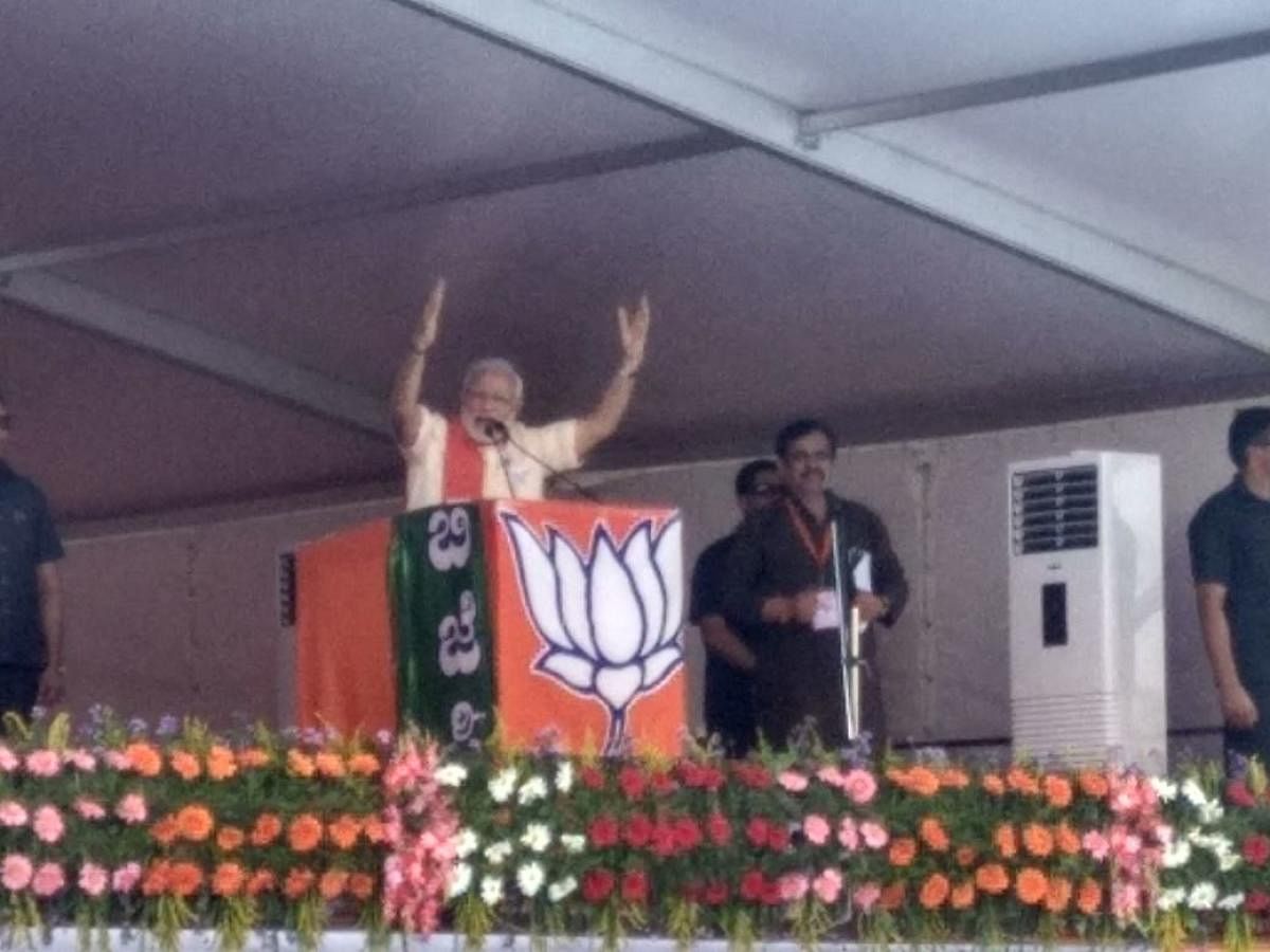 In picture: d Prime Minister Narendra Modi in a massive BJP election rally in Chitradurga on Sunday. DH Photo. 