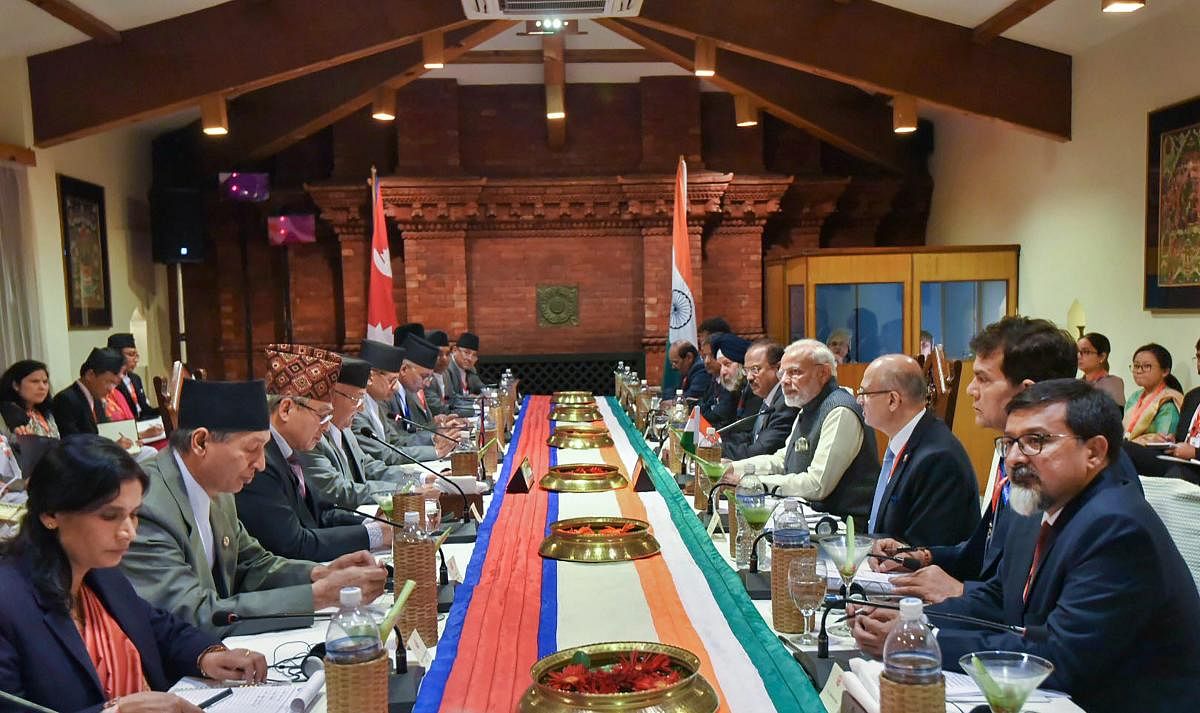 Prime Minister Narendra Modi with his Nepali counterpart KP Sharma Oli and others during delegation level talks in Kathmandu on Friday. (PTI Photo / PIB)