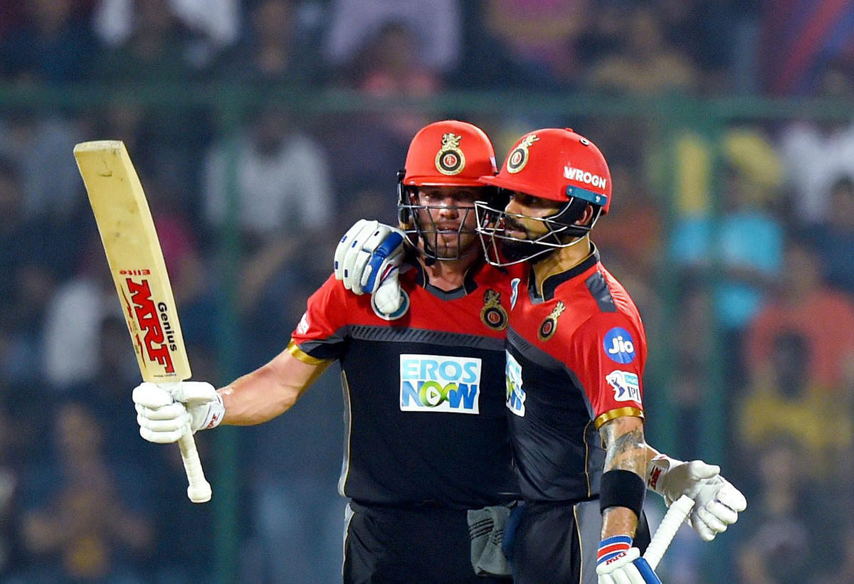 TWIN TROUBLE A lot will once again depend on AB de Villiers (left) and skipper Virat Kohli as they take on Kings XI Punjab on Monday. PTI