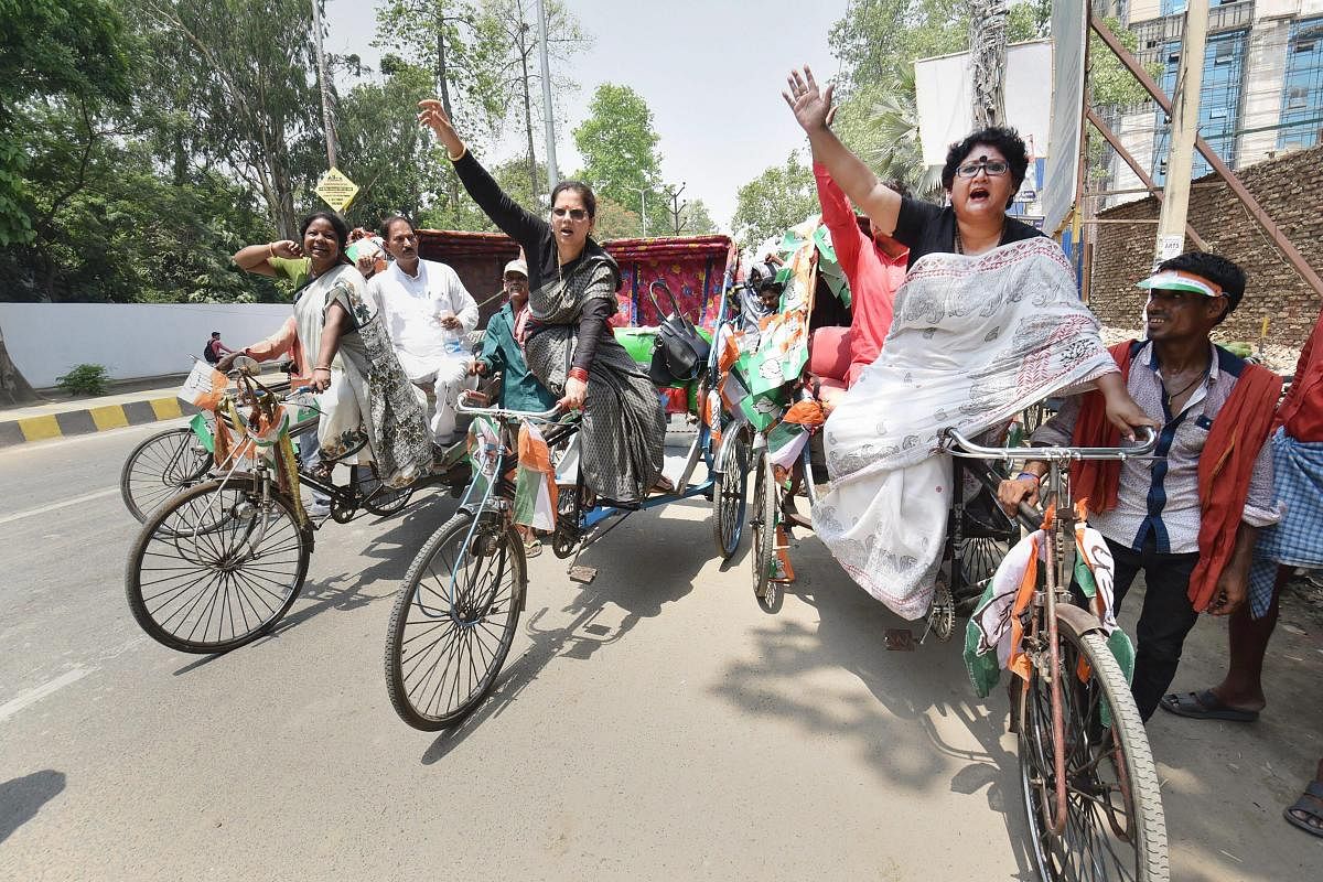 Congress women riding rickshaw during a protest against the rising fuel prices, essential commodities and the 4th anniversary of the Narendra Modi-led BJP government, in Patna on Saturday. ( PTI Photo)