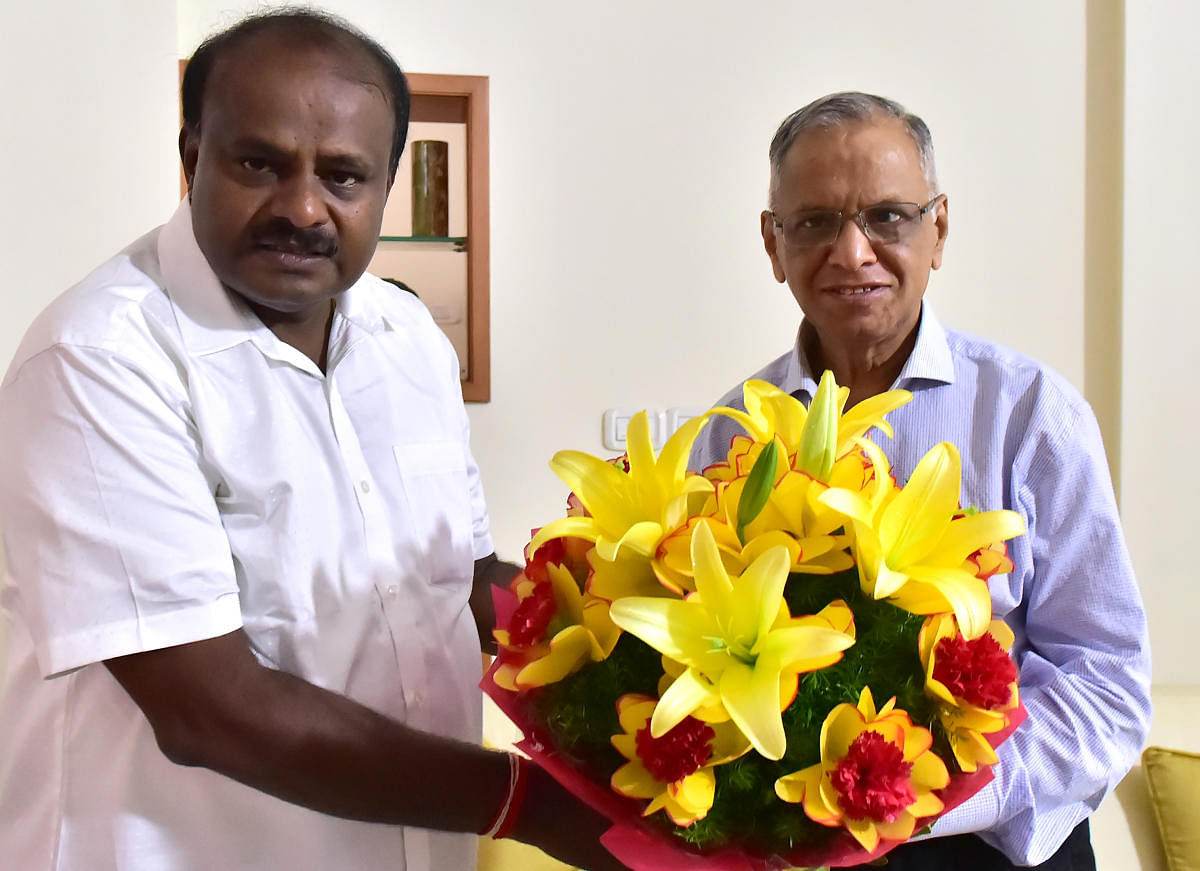 Chief Minister H D Kumaraswamy with Infosys founder N R Narayana Murthy on Friday. DH FILE 