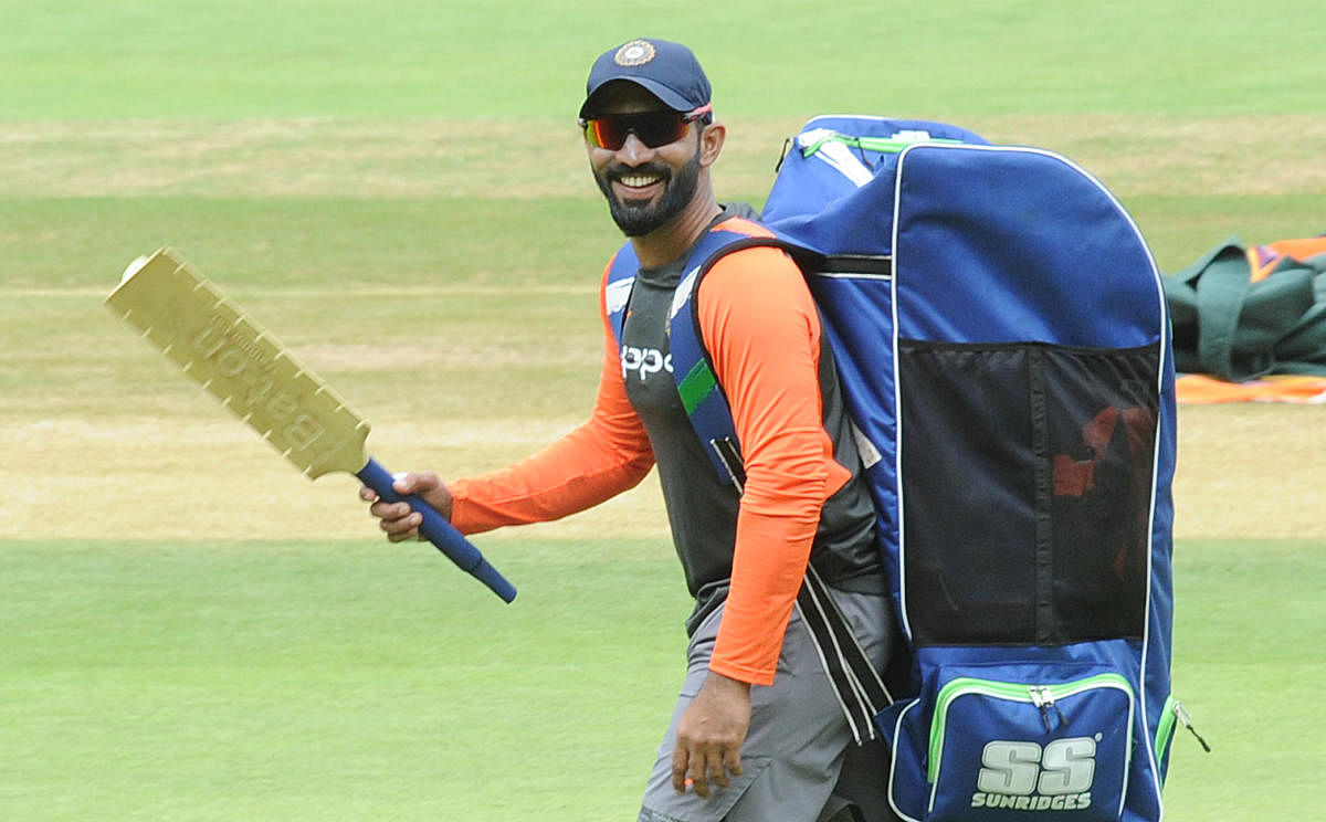 BACK IN THE FOLD: Wicketkeeper-batsman Dinesh Karthik during India's practice session at the M Chinnaswamy Stadium in Bengaluru on Tuesday. DH Photo/ Srikanta Sharma R