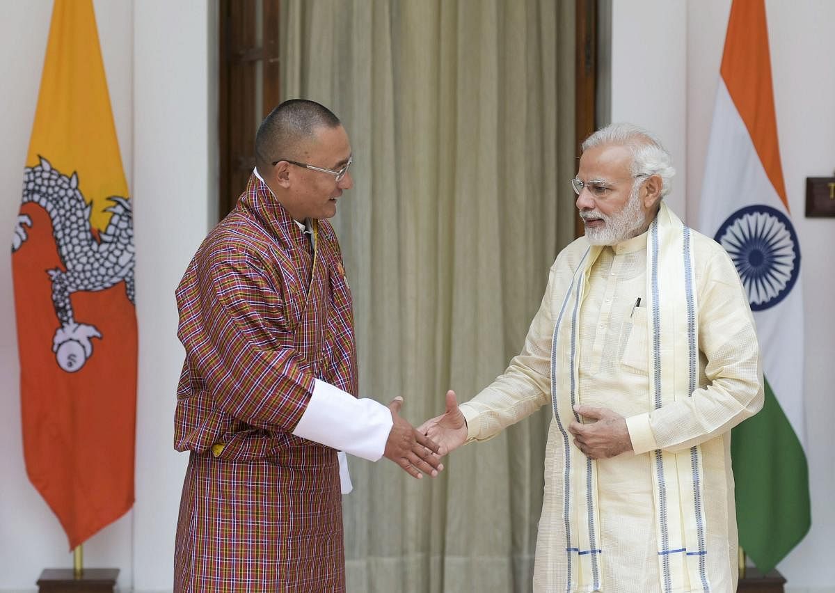 New Delhi: Prime Minister Narendra Modi and Bhutanese Prime Minster Dasho Tshering Tobgay before their meeting at Hyderabad House, in New Delhi on Friday, July 6, 2018.(PTI Photo/Vijay Verma)