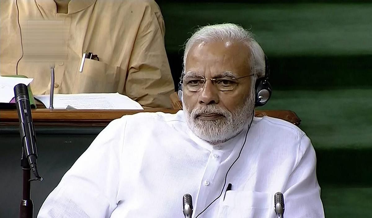 Prime Minister Narendra Modi listens to the debate on the no-confidence motion in the Lok Sabha during the Monsoon session of Parliament, in New Delhi on Friday. PTI photo