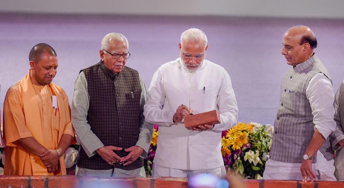 Prime Minister Narendra Modi with Union Home Minister Rajnath Singh, UP Governor Ram Naik and Chief Minister Yogi Adityanath at a groundbreaking ceremony to launch various projects worth Rs 60,000 crore, at Indira Gandhi Pratishthan in Lucknow on Sunday.