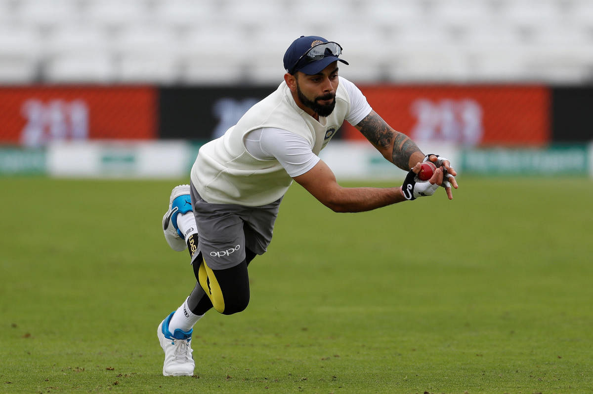 TOUGH NUT: Skipper Virat Kohli appeared in no visible discomfort during India’s practice session on Friday. Reuters