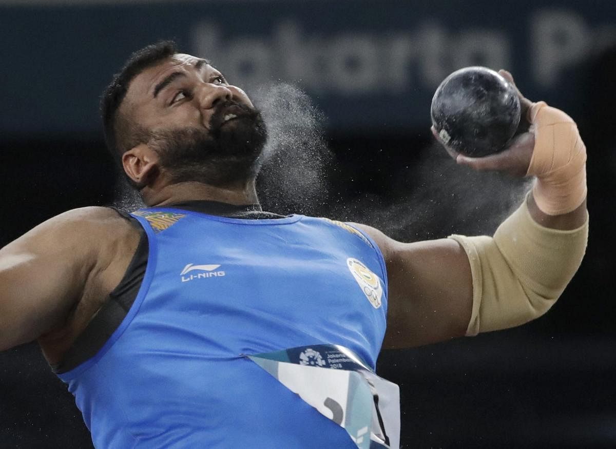 India's Tajinderpal Singh Toor en route to his men's shot put gold at the Asian Games in Jakarta on Saturday, AP/ PTI