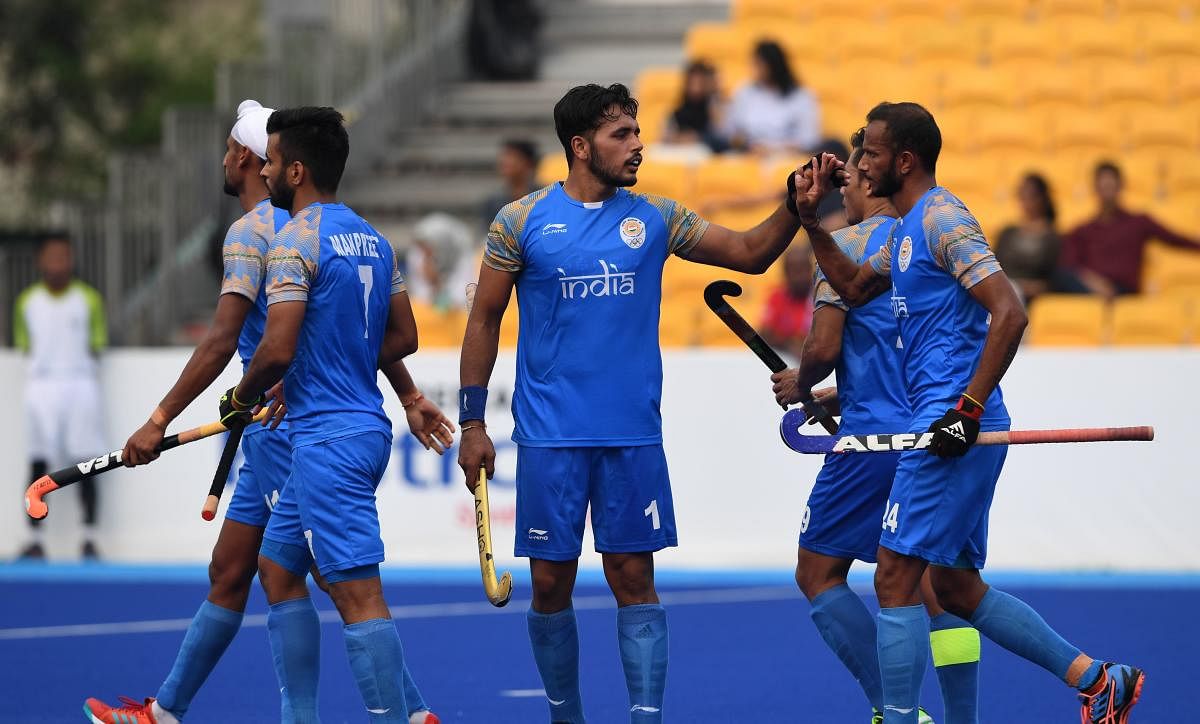 DOMINANT India's (from left) Akashdeep Singh, Manpreet Singh, Harmanpreet Singh, Chinglensana Singh and SV Sunil celebrate after scoring a goal against Sri Lanka in Jakarta on Tuesday. AFP