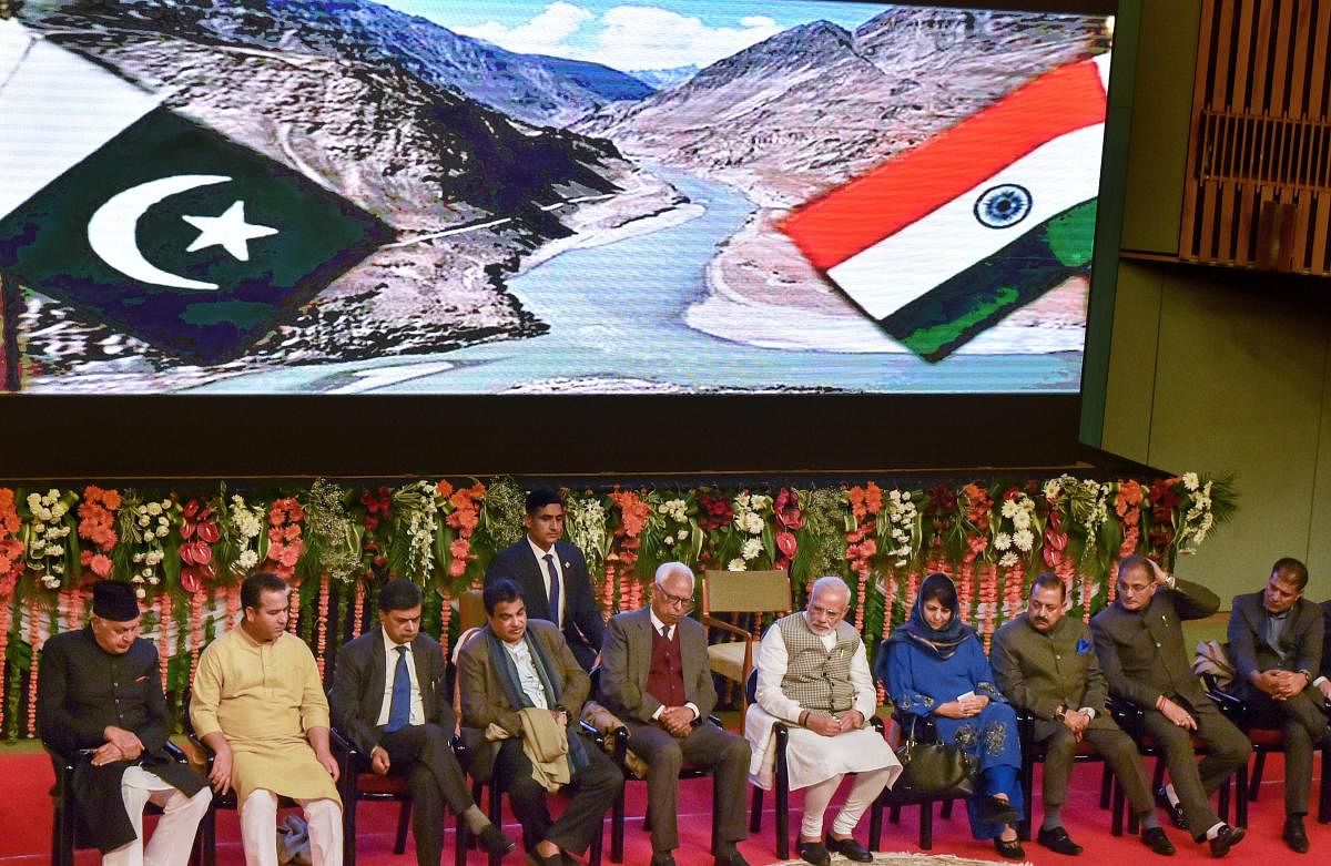 Prime Minister Narendra Modi with J&K Governor NN Vohra, Chief Minister Mehbooba Mufti and other dignitaries after inaugurating Kishanganga Power Station (330 MW) Bandipora, during a function at SKICC in Srinagar. PTI