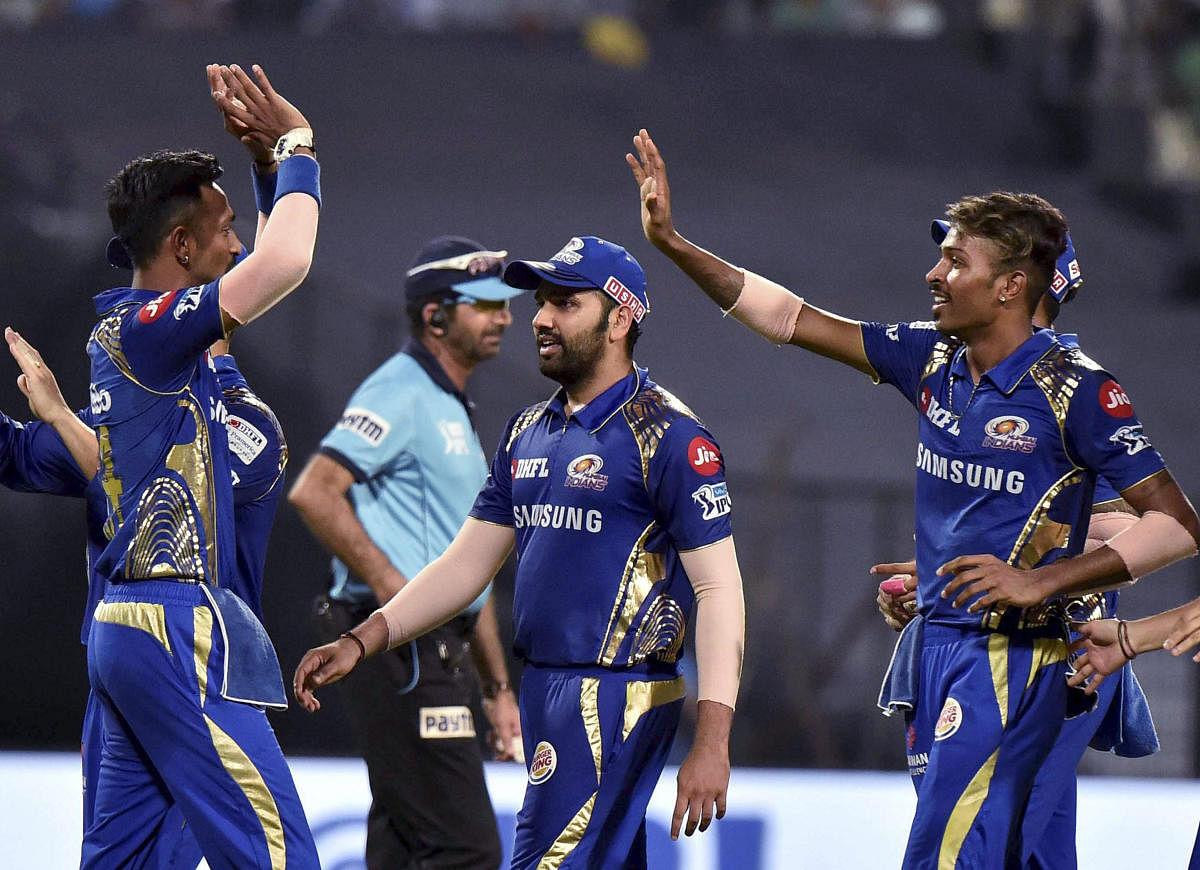 WATCH THEM OUT: The Pandya brothers -- Hardik (right) and Krunal -- will be looking to continue their good run and power Mumbai Indians to the play-offs. AFP