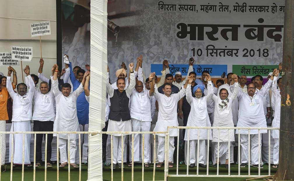 Congress president Rahul Gandhi, former prime minister Manmohan Singh, NCP supremo Sharad Pawar and other Opposition party leaders during the 'Bharat Bandh' protest against fuel price hike and depreciation of the rupee, in New Delhi on Monday. (PTI Photo)