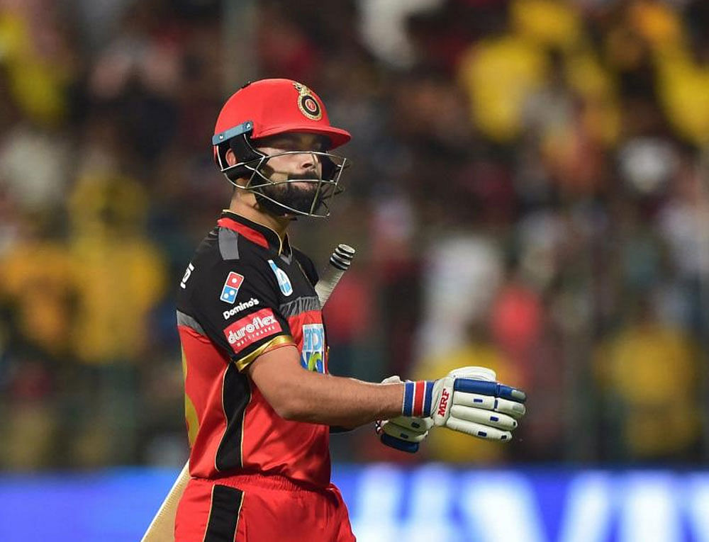Kohli faces a fine of Rs 12 lakh for slow-bowling in the match against CSK. PTI photo.