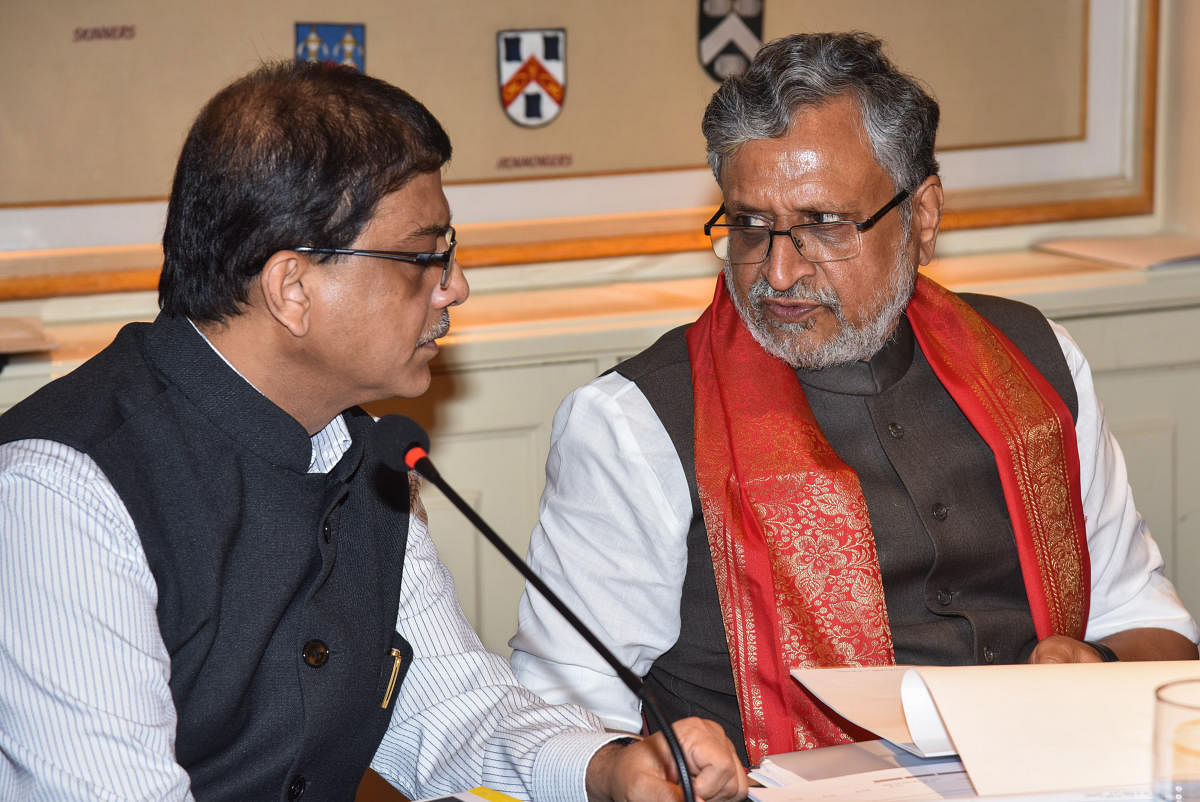 File Photo: Prakash Kumar, CEO GST and Sushil Modi, Deputy Chief Minister of Bihar at a press meet after the meeting of Group of Ministers to monitor and resolve IT challenges faced in Implementations of GST at Hotel ITC Windsor. DH Photo